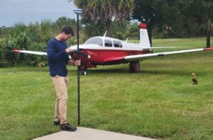 Roger Morales, MS Eng, PSM, FAA Commercial Pilot, performs a detailed land survey for a home addition in Aero Acres Aviation Community, Port St. Lucie, Florida. Combining aviation and surveying precision with his Mooney M20J aircraft.